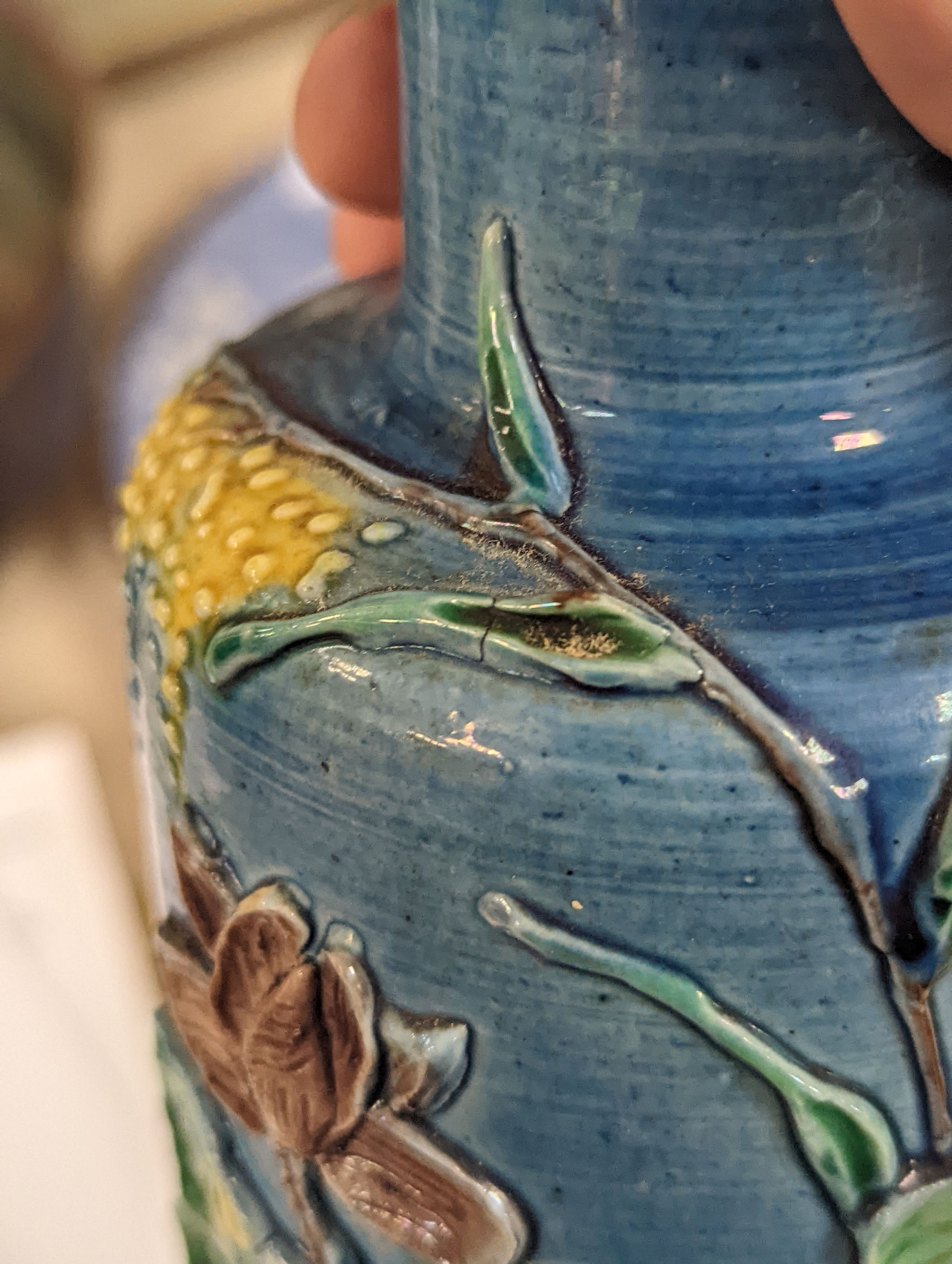 An early 20th century Chinese blue and white lidded vase together with a similar enamelled pottery vase and a Japanese blue and white dish. Tallest vase 29cm